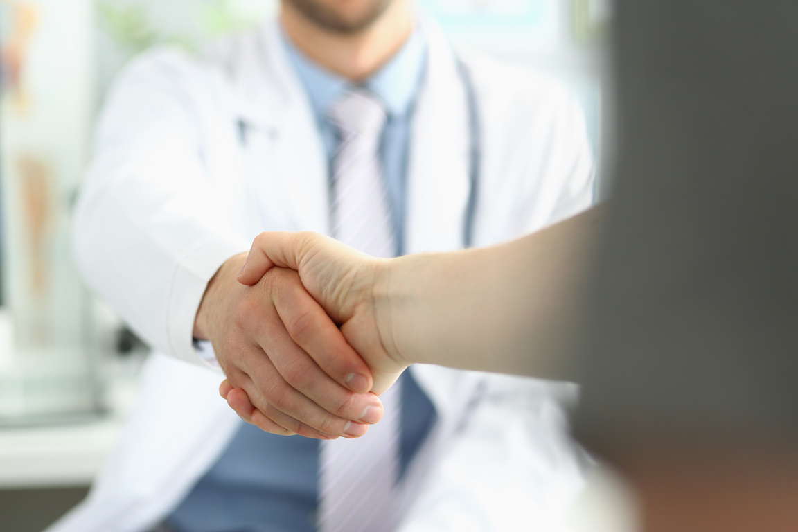 Doctor and Patient Shaking Hands, Grateful Person
